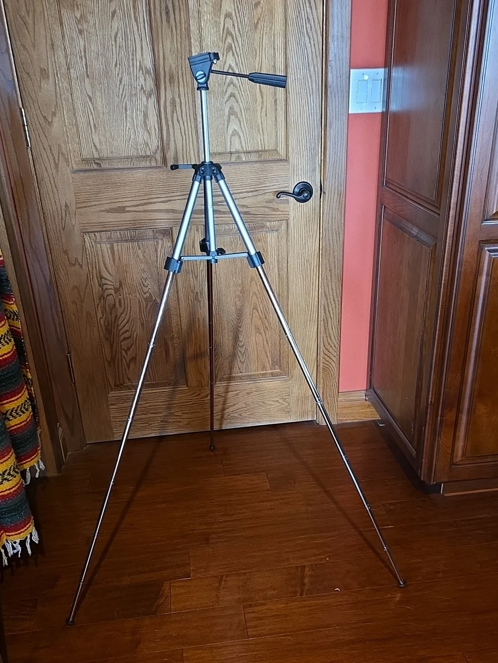 2 Lightweight Tripods-1 is a mini ( 2nd pic) portable & adjustable w carry case.
